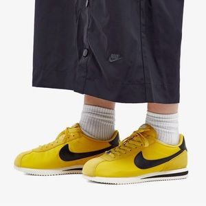 yellow nike cortez sneakers